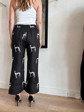 Load image into Gallery viewer, Zimmerman - Printed Silk Twill Flare Pants - Black w dog print - 1 - RRP$1245

